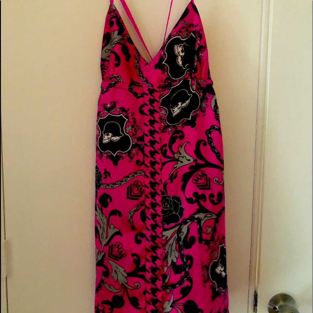 You will LOVE this summer dress . Polyester material that looks like fine silk